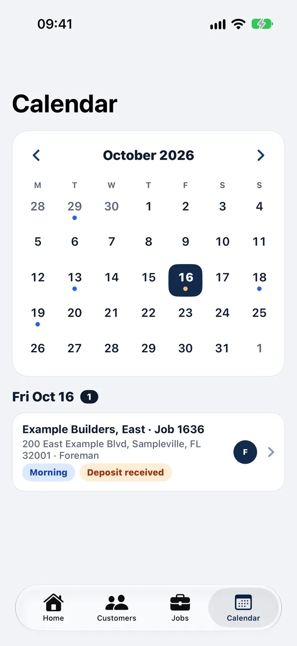 The calendar in the iPhone app: October with a dot on each day that has work, and the job on the day picked.